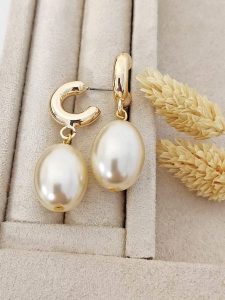 Luja Bijoux Pozłacane kolczyki-wkrętki z perłami rozmiar: onesize. Brązowe kolczyki Luja Bijoux, z perłą, metalowe. Za 50,95 zł.