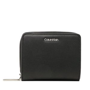 Portfel Calvin Klein. Czarne portfele Calvin Klein, bez wzorów. Za 139,99 zł.