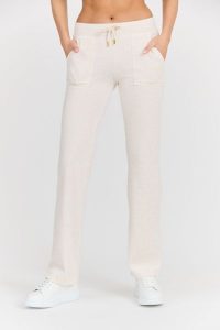JUICY COUTURE Damskie beżowe dresowe spodnie Del Ray Gold HW. Brązowe spodnie dresowe Juicy Couture, s, bez wzorów, z bawełny. W wyprzedaży za 331,99 zł.