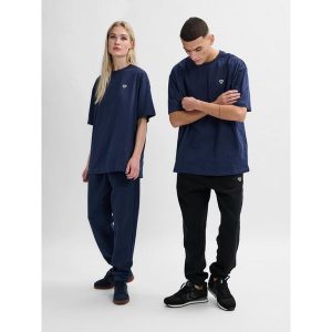 Koszulka Hummel Loose Bee. Niebieskie bluzki Hummel, bez wzorów, sportowe, bez kołnierzyka, bez ramiączek. W wyprzedaży za 101,00 zł.