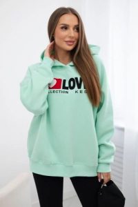 Bluza bawełniana ocieplana z kapturem Love miętowa. Zielone bluzy KESI, l, bez wzorów, z bawełny, z kapturem. Za 271,84 zł.