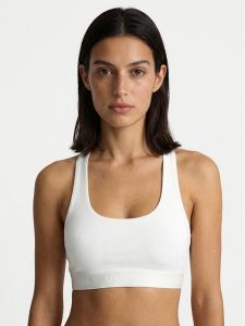 Guess Biustonosz top O6GC04 KE831 Écru. Biustonosze Guess, xs, z aplikacjami, bez kołnierzyka, bez ramiączek. Za 159,99 zł.