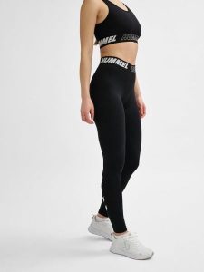 Damskie bawełniane legginsy o średnim kroju Hummel TE Maja. Czarne legginsy Hummel, bez wzorów, z bawełny, z standardowym stanem. Za 161,50 zł.