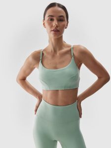4F Biustonosz do jogi i pilatesu z niskim wsparciem - turkusowy XL. Niebieskie biustonosze 4f, bez wzorów, z dzianiny. W wyprzedaży za 59,99 zł.