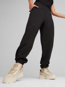 Puma Spodnie dresowe "Infuse" w kolorze czarnym rozmiar: M. Czarne spodnie dresowe Puma, m, bez wzorów, z dresówki. Za 153,34 zł.