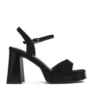 Sandały JENNY. Czarne sandały Jenny, bez wzorów, bez obcasa, na słupku, bez zapięcia. Za 149,99 zł.