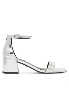 Nine West Sandały ERMINA FF-2308 Srebrny. Szare sandały Nine West, bez wzorów, ze skóry, bez obcasa, na słupku, bez zapięcia. Za 119,99 zł.