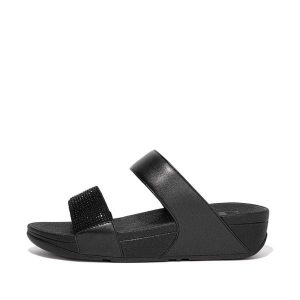 Kobiece klapki na koturnie FitFlop Lulu Hotfix. Czarne klapki FIT FLOP, bez wzorów, bez obcasa, na koturnie. Za 376,75 zł.