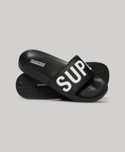 Superdry Vegan Core Pool japonki damskie z materiału syntetycznego – BLACK/WHITE. Czarne klapki Superdry, bez wzorów, z poliesteru, bez obcasa. Za 172,00 zł.