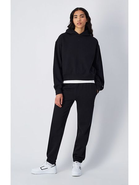 Champion Spodnie dresowe w kolorze czarnym rozmiar: M. Czarne spodnie dresowe Champion, m, bez wzorów, z dresówki. Za 136,45 zł.