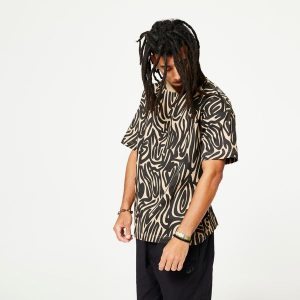 Koszulka do tańca Starever oversize. Brązowe bluzki STAREVER, xs, bez wzorów, z bawełny, sportowe, bez kołnierzyka, bez ramiączek. W wyprzedaży za 29,99 zł.