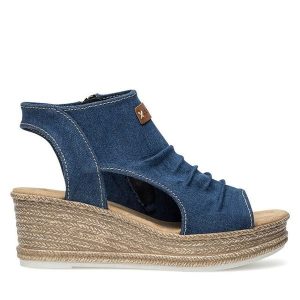 Sandały Rieker. Niebieskie sandały Rieker, bez wzorów, bez obcasa, na koturnie, bez zapięcia. Za 329,99 zł.