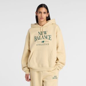 Bluza damska New Balance WT61U6QSABC - żółta. Żółte bluzy New Balance, xl, bez wzorów, z bawełny, bez kaptura. Za 299,99 zł.