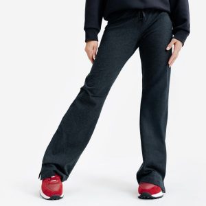 Rozszerzane legginsy damskie Elementals. Brązowe legginsy DECATHLON, bez wzorów, z bawełny. Za 89,99 zł.