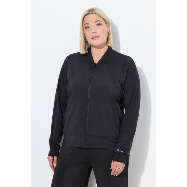 Damskie Bluza dresowa funkcyjna stójka otwór na kciuk z recyklingu. Czarne bluzy Ulla Popken, plus size, bez wzorów, z dresówki, bez kaptura. Za 279,99 zł.