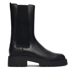 Sztyblety Calvin Klein. Czarne botki Calvin Klein, bez wzorów, bez obcasa, na płaskiej podeszwie, bez zapięcia. Za 579,99 zł.