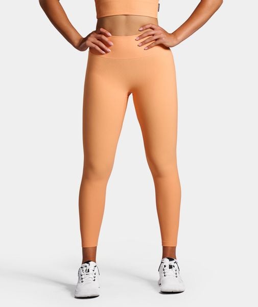 Legginsy Rib sportowe damskie. Brązowe legginsy NORDICDOTS, bez wzorów, z materiału. Za 365,00 zł.