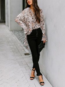 LA Angels Bluzka w kolorze biało-brązowym rozmiar: S. Białe bluzki LA Angels, s, bez wzorów, bez kołnierzyka, bez ramiączek. Za 126,99 zł.