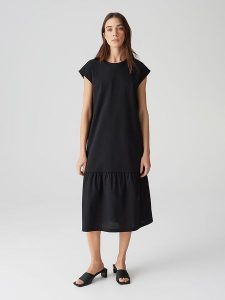 OPUS Sukienka "Welin" w kolorze czarnym rozmiar: 36. Czarne sukienki Opus, bez wzorów, z bawełny, bez kołnierzyka, bez ramiączek, midi. Za 189,95 zł.