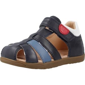Sandały Geox Model B S.macchia B. Niebieskie sandały Geox, bez wzorów, ze skóry, bez obcasa, bez zapięcia. Za 209,99 zł.