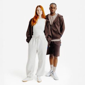 Bluza na suwak unisex Elementals. Brązowe bluzy DECATHLON, uniwersalny, bez wzorów, z bawełny, z kapturem. Za 199,99 zł.