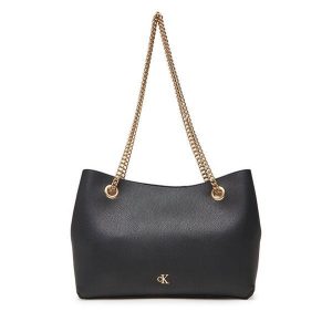 Torebka Calvin Klein. Czarne torebki wieczorowe Calvin Klein, bez wzorów, bez dodatków. Za 369,99 zł.
