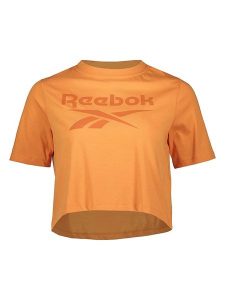 Reebok Koszulka w kolorze pomarańczowym rozmiar: S. Pomarańczowe bluzki Reebok, s, bez wzorów, bez kołnierzyka, bez ramiączek. Za 57,06 zł.