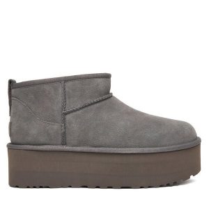 Śniegowce Ugg. Szare buty zimowe Ugg, bez obcasa, bez zapięcia. Za 759,99 zł.