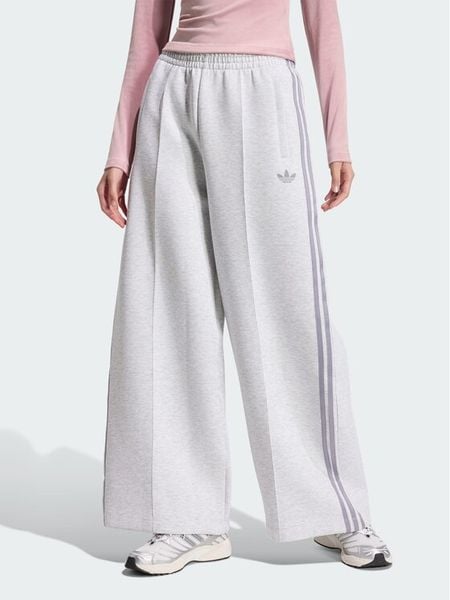 Adidas Spodnie dresowe Spacer HY8044 Szary jasny Wide Leg. Szare spodnie dresowe ADIDAS, m, bez wzorów, z bawełny. Za 298,99 zł.