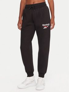 Reebok Spodnie dresowe Stacey RK25166CCW Czarny Regular Fit. Czarne spodnie dresowe Reebok, xs, bez wzorów, z dresówki. Za 199,99 zł.