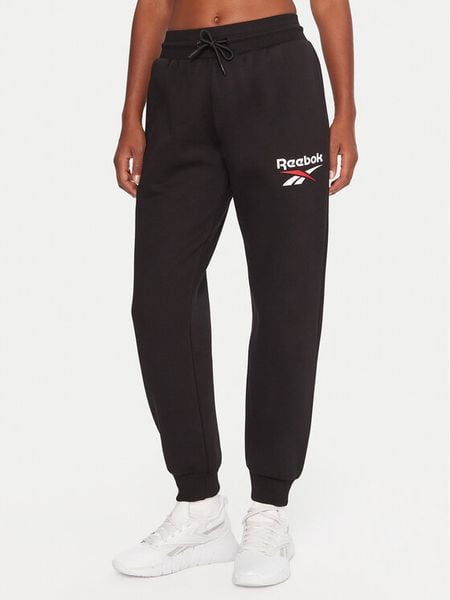 Reebok Spodnie dresowe Stacey RK25166CCW Czarny Regular Fit. Czarne spodnie dresowe Reebok, xs, bez wzorów, z dresówki. Za 109,99 zł.