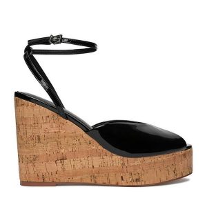 Sandały Badura. Czarne sandały Badura, bez wzorów, bez obcasa, na koturnie, bez zapięcia. Za 249,99 zł.