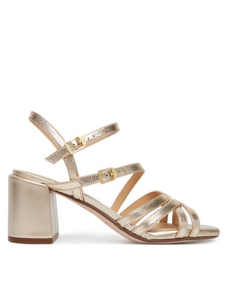 Clarks Sandały Ezoria Strap 26185896 Złoty. Żółte sandały Clarks, bez wzorów, ze skóry, bez obcasa, na słupku, bez zapięcia. Za 389,99 zł.