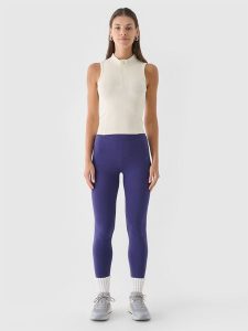 4F Legginsy dzianinowe damskie - granatowe L. Niebieskie legginsy 4f, bez wzorów, z bawełny, z podwyższonym stanem. W wyprzedaży za 59,99 zł.