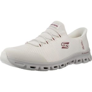 Buty SKECHERS SLIP-INS GLIDE STEP VIBEY Biały. Białe buty trekkingowe Skechers, z tkaniny, bez zapięcia. Za 389,99 zł.