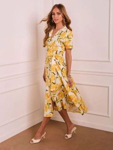 Milan Kiss Sukienka w kolorze żółto-zielono-kremowym rozmiar: M. Brązowe sukienki Milan Kiss, m, bez wzorów, z tkaniny, bez kołnierzyka, bez ramiączek, midi, rozkloszowane. Za 208,99 zł.