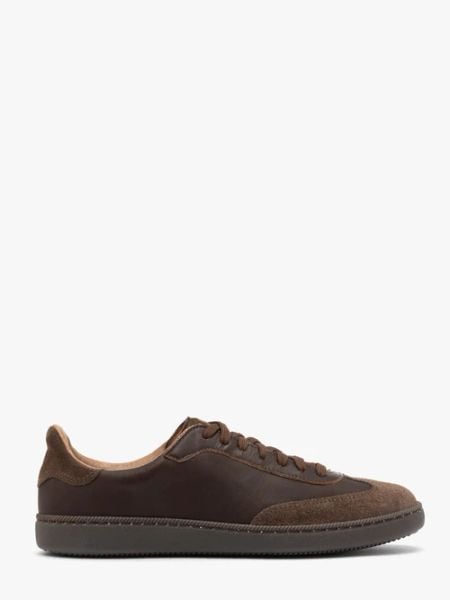 Brązowe półbuty sportowe na płaskiej podeszwie. Brązowe półbuty Ryłko, bez wzorów, ze skóry, z okrągłym noskiem, bez obcasa, na płaskiej podeszwie, bez zapięcia. Za 429,99 zł.