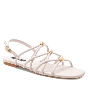Sandały Nine West. Białe sandały Nine West, bez wzorów, bez obcasa, na płaskiej podeszwie, bez zapięcia. Za 159,99 zł.