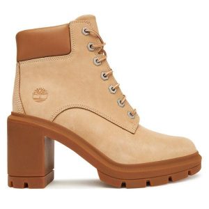 Trzewiki Timberland. Brązowe botki Timberland, bez wzorów, bez obcasa, na słupku, bez zapięcia. Za 539,99 zł.