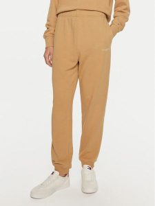 Tommy Hilfiger Spodnie dresowe WW0WW42883 Beżowy Regular Fit. Brązowe spodnie dresowe TOMMY HILFIGER, xxl, bez wzorów, z bawełny. Za 419,99 zł.