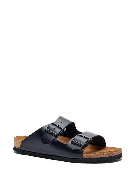 Comfortfusse Skórzane klapki w kolorze czarnym rozmiar: 41. Czarne klapki Comfortfüße, bez wzorów, ze skóry, z otwartym noskiem, bez obcasa. Za 200,60 zł.