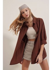 Trendyol Koszula w kolorze ciemnobrązowym rozmiar: 46. Brązowe koszule Trendyol, bez wzorów, z bawełny, bez kołnierzyka, bez ramiączek. Za 70,08 zł.