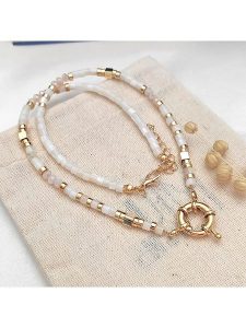 Atelier MIU Pozłacany naszyjnik z elementami ozdobnymi - dł. 42 cm rozmiar: onesize. Brązowe naszyjniki Atelier MIU, pozłacane. Za 69,99 zł.