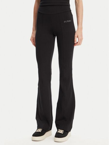 Guess Spodnie dresowe V5RB15 KCD02 Czarny Regular Fit. Czarne spodnie dresowe Guess, xs, z aplikacjami, z dresówki. Za 179,99 zł.