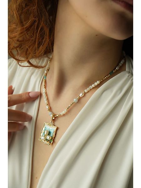 Pierres delicates Pozłacany naszyjnik z zawieszką - dł. 50 cm rozmiar: onesize. Białe naszyjniki Pierres delicates, z perłą, pozłacane. Za 109,78 zł.