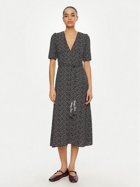 Tommy Jeans Sukienka codzienna DW0DW20450 Czarny Regular Fit. Czarne kombinezony Tommy Jeans, m, bez wzorów, z jeansu, bez kołnierzyka, bez ramiączek. Za 339,99 zł.