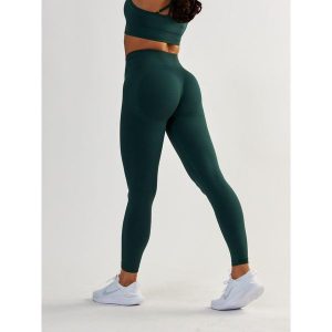 Legginsy fitness damskie Beshaped Shape Up modelujące. Fioletowe legginsy BESHAPED, bez wzorów, z nylonu. W wyprzedaży za 152,15 zł.
