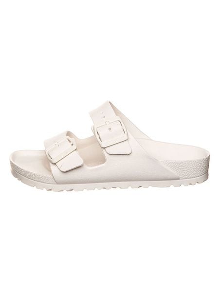 Birkenstock Klapki "Birkenstock Arizona" w kolorze kremowym rozmiar: 37. Brązowe klapki Birkenstock, bez wzorów, z otwartym noskiem, bez obcasa. Za 196,24 zł.