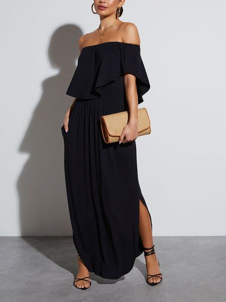 Milan Kiss Sukienka w kolorze czarnym rozmiar: M. Czarne sukienki Milan Kiss, m, bez wzorów, bez kołnierzyka, bez ramiączek, maxi. Za 135,81 zł.