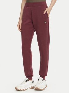 Guess Spodnie dresowe V4YB08 KCAY2 Bordowy Regular Fit. Czerwone spodnie dresowe Guess, m, z aplikacjami, z dresówki. Za 344,99 zł.